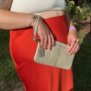 Coach gold metallic leather wristlet